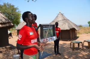 Mary Arok delivering a training session on explosive ordnance risk education in Birisi village, in the southern part of South Sudan. ©UNMISS