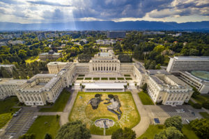 An aerial view shows a giant ephemeral landart painting by Swiss French artist Saype entitled "World in Progress" representing two children drawing their ideal world, at the European headquarters of the United Nations in Geneva, Switzerland, Wednesday, June 24, 2020. The artwork covering 6000 square meters was produced with biodegradable paints made from natural pigments such as coal and chalk. The fresco, offered by Switzerland, for the the 75th anniversary of the signing of the United Nations Charter in San Francisco on 26.6.1945 will be inaugurated by Swiss Federal Councillor Ignazio Cassis, in the presence of the Director-General of the United Nations Office in Geneva, Tatiana Valovaya. (Valentin Flauraud for Saype)